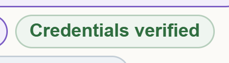 The green Credentials verified badge.