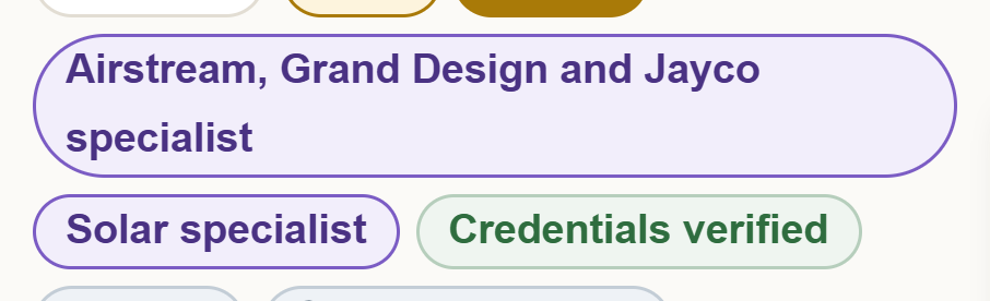 Two purple specialist badges: Airstream, Grand Design and Jayco specialist, and Solar specialist.